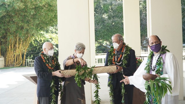 Outgoing EWC President Richard Vuylsteke presented Vares-Lum with a lauhala mat that Kahu Kordell Kekoa (at far right) said symbolizes responsibility for a community woven together from many strands, "as well as a place where people can sit together to build a better world." EWC Board of Governors Chairman James Scott is also pictured for the inauguration, which took place Jan. 10.
