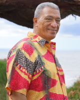 Politician wearing aloha shirt in headshot
