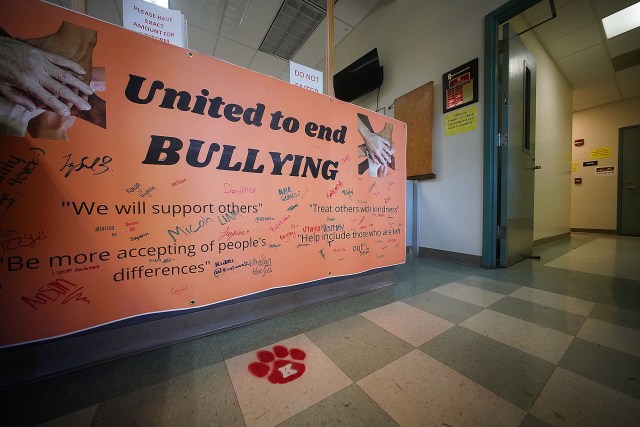 Kea'au High School sign 'United to end Bullying' located in the school administration office.