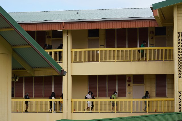 Final bell just rang and Pahoa High and Intermediate School students head home for the day.