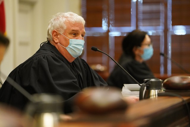 Hawaii State Supreme Court Chief Justice Recktenwald listens to oral arguments regarding a reapportionment case.