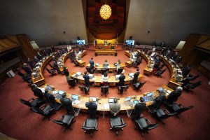 House members gather at the beginning of the first public in person floor session.
