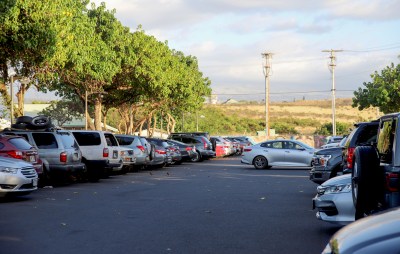 A photo of a public parking lot in Paia