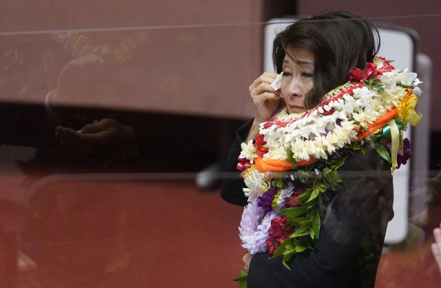 Representative Sylvia Luke wipes a tear away during floor session honoring some lawmakers that were leaving office.
