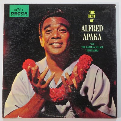 Alfred Apaka in his classic white shirt with red carnation lei.
