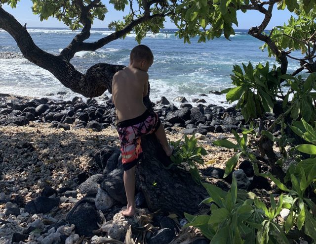J.J. at the beach on the day his grandmother found out he'd been adopted by his foster family.