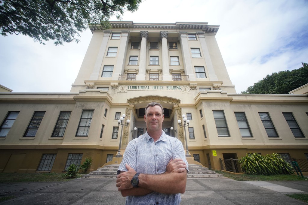 Portrait of Jay Griffin fronting the Territorial Office Building