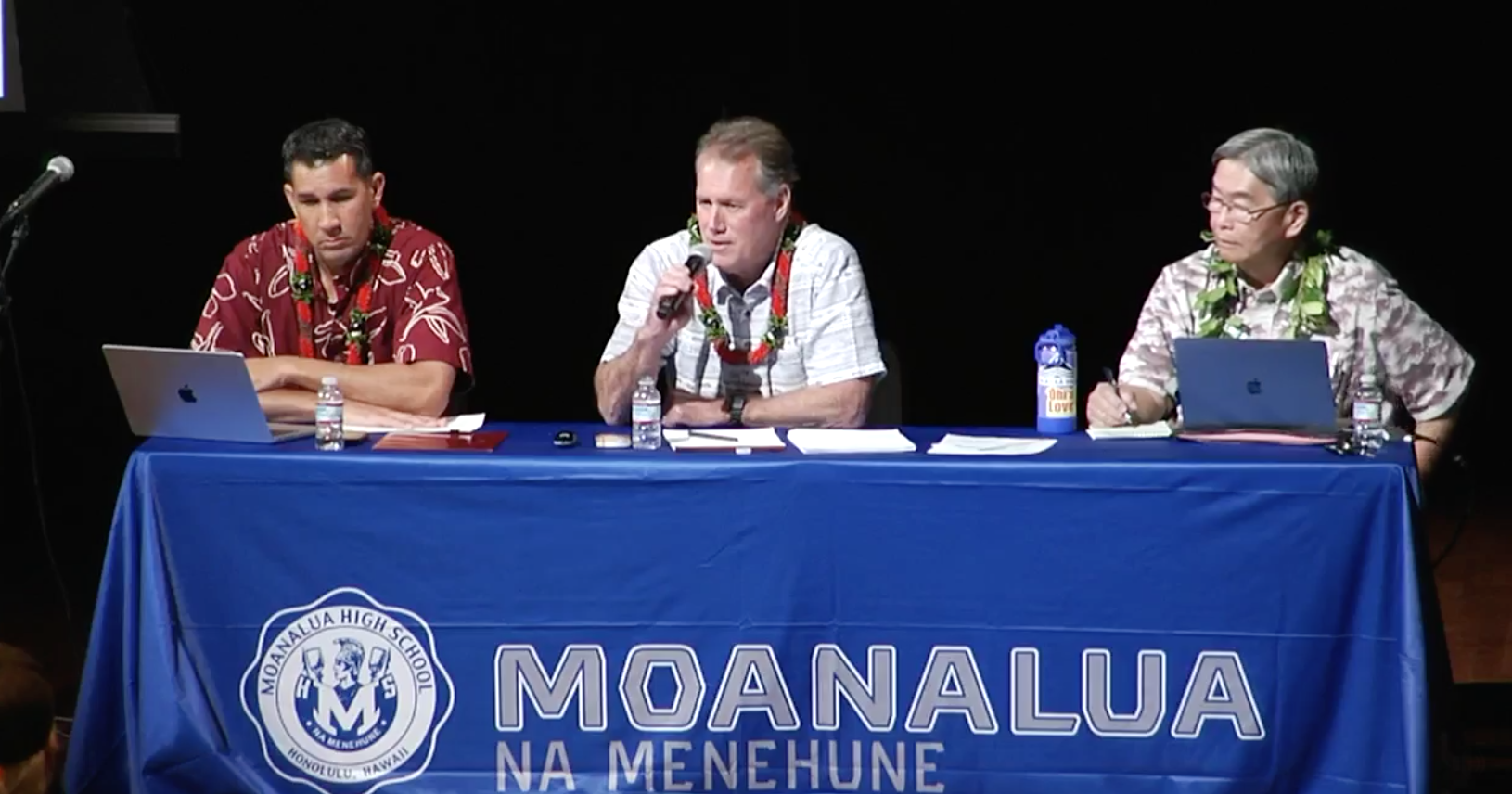 Congressmen Kai Kahele and Ed Case and Honolulu Board of Water Supply Chief Engineer Ernie Lau speak at a town hall on Red Hill on June 20, 2022.