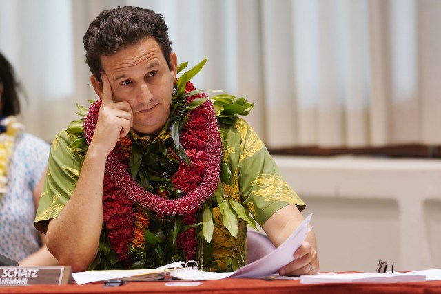 Senator Brian Schatz listens during a field hearing held at the East West Center Auditorium.