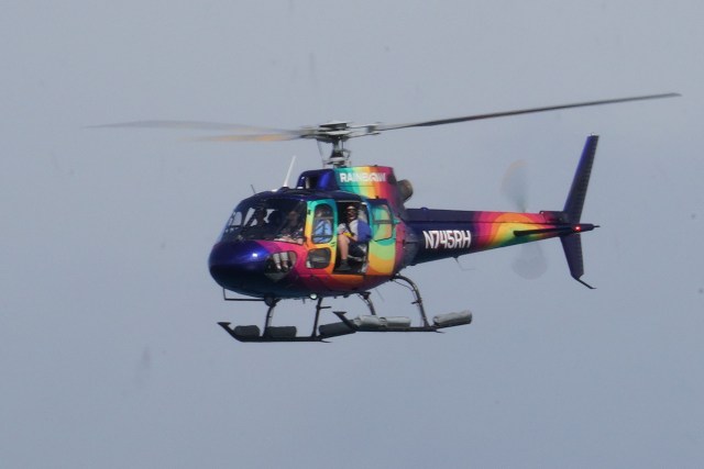 N745RH Aerospatiale AS350 BA AStar helicopter flies offshore Ala Moana Beach Park.