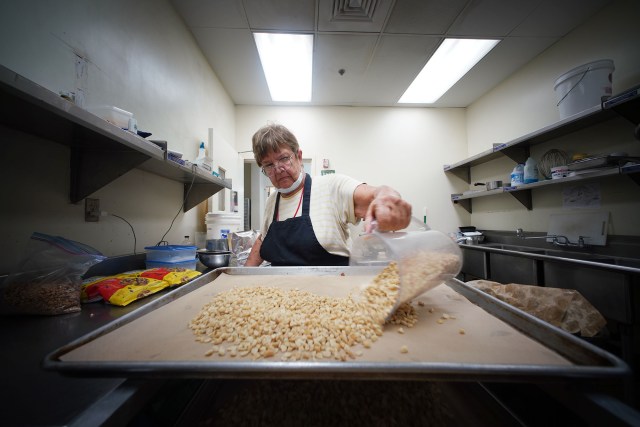 Aunty Nani Ho prepares to make cookie dough at Pacific Gateway Center's kitchens. Nani is the owner of Aunty Nani's Cookies and sells her products at local venues.