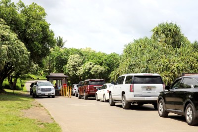 A photo of a line of cars waiting to enter the Kipahulu District of Haleakala National Park