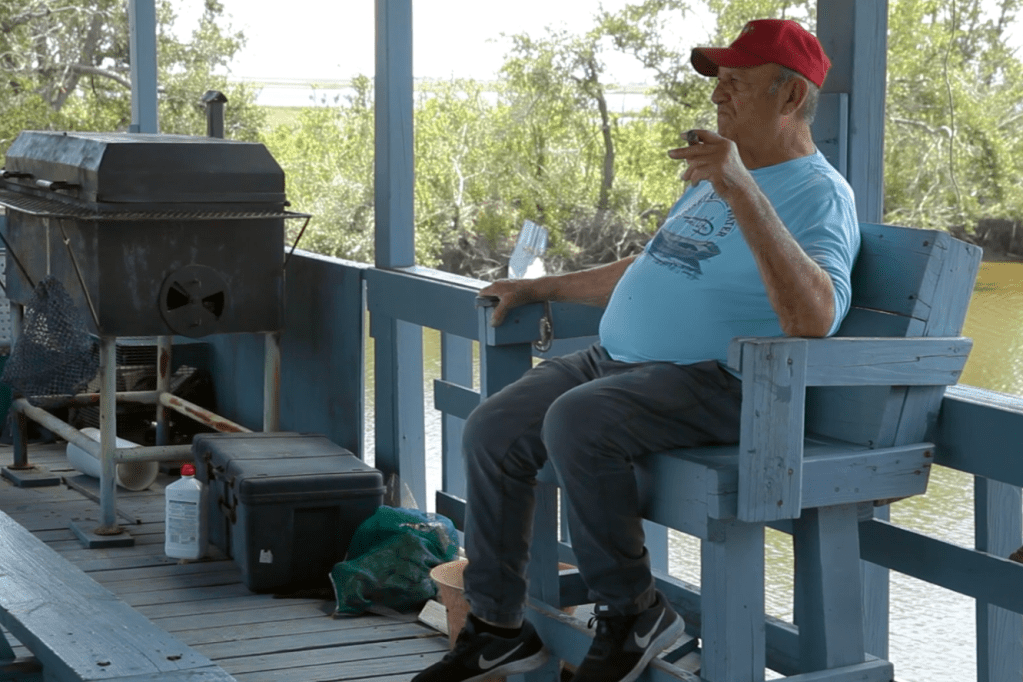 Johnny Tamplet sitting outdoors