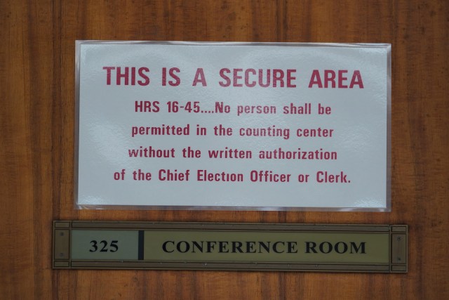 2022 primary election sign on Capitol room 325 stating the area is secure for election ballot sorting.