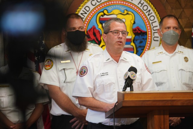 Honolulu EMS Director Dr. Jim Ireland speaks with Mayor Blangiardi at a press conference held at Honolulu Hale on the ambulance that caught fire. Ireland said that the Honolulu Fire Department was taking the lead on the fire investigation.