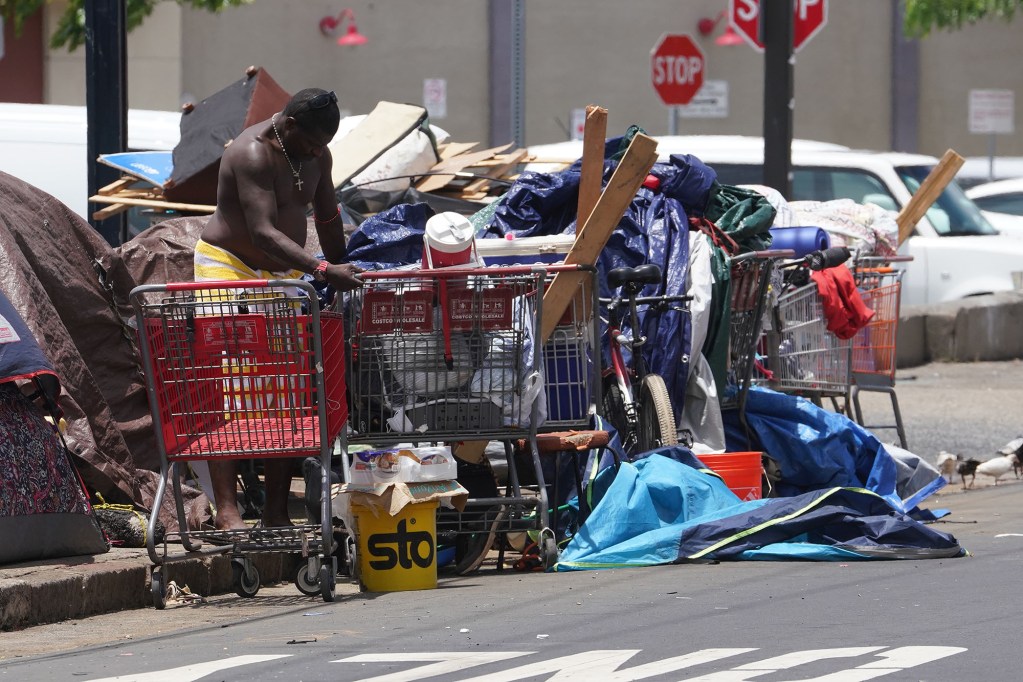 Shopping carts and tents located on Sumner Street near the Institute of Human Services.