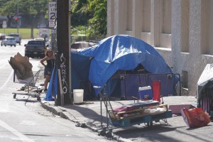 Tents and other belongings along Iwilei Road near the Salvation Army building.