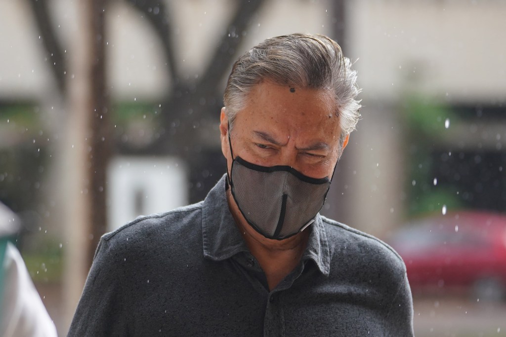 Milton Choy arrives at US District Court.