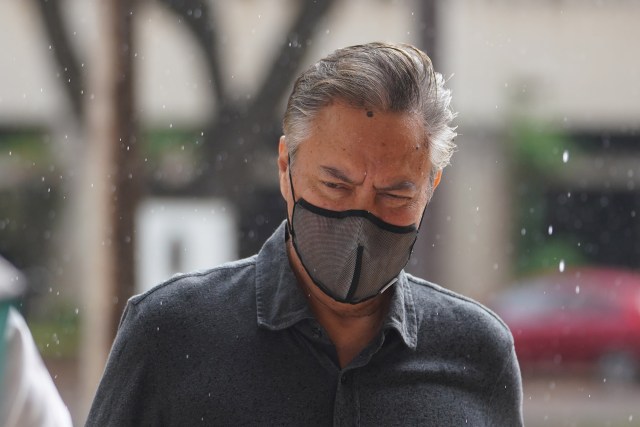 Milton Choy arrives at US District Court.