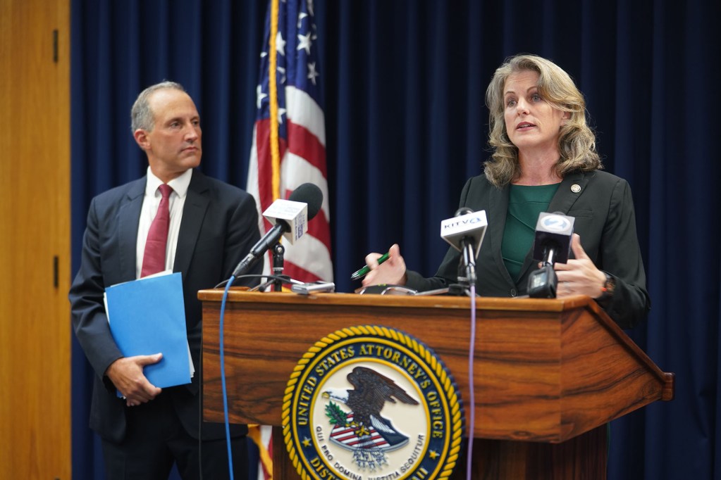 US Attorney Clare E. Connors and left, FBI Special Agent in Charge Steven Merrill duriing a press conference announcing charges against Stewart Olani Stant and Milton Choy.