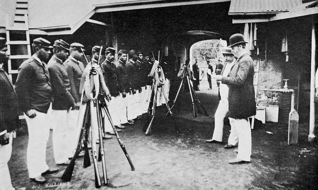 Col. John Harris Soper disarming Queen Liluokalani's household guard after the overthrow.