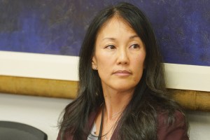DPP Director Dawn Takeuchi Apuna listens to media questions during Mayor Blangiardi's press conference held at Honolulu Hale.