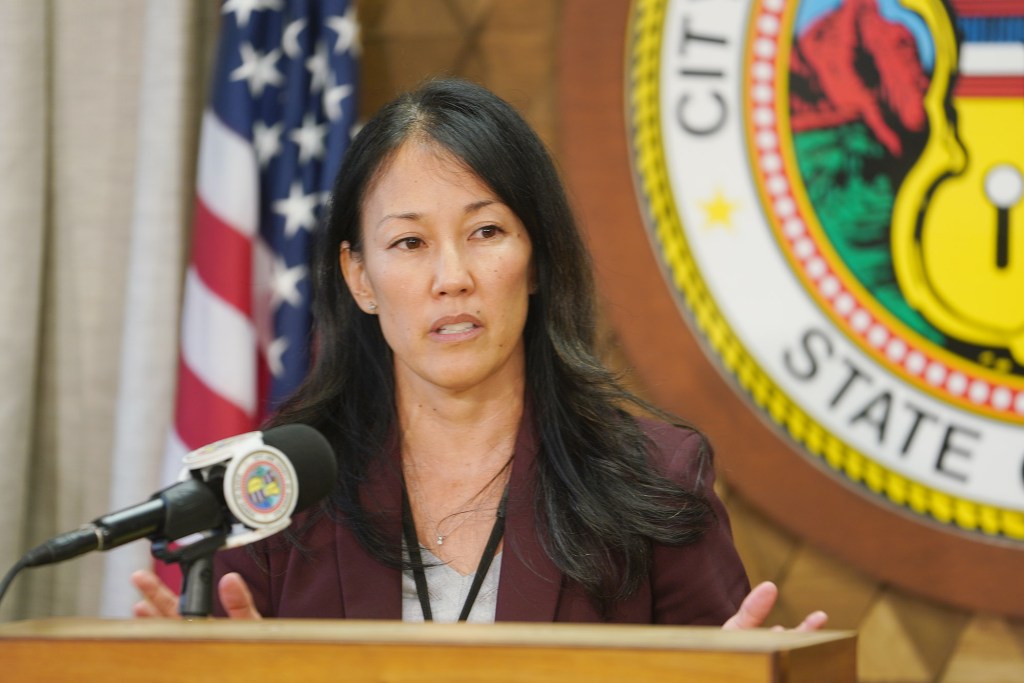 DPP Director Dawn Takeuchi Apuna assists with media questions during Mayor Blangiardi's press conference held at Honolulu Hale.