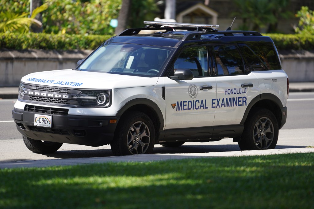 Honolulu Medical examiner vehicle parked near Honolulu Hale.
