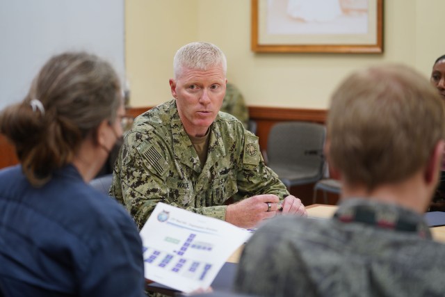 Rear Admiral John Wade, Commander, Joint Task Force Red Hill speaks to media at a press conference.
