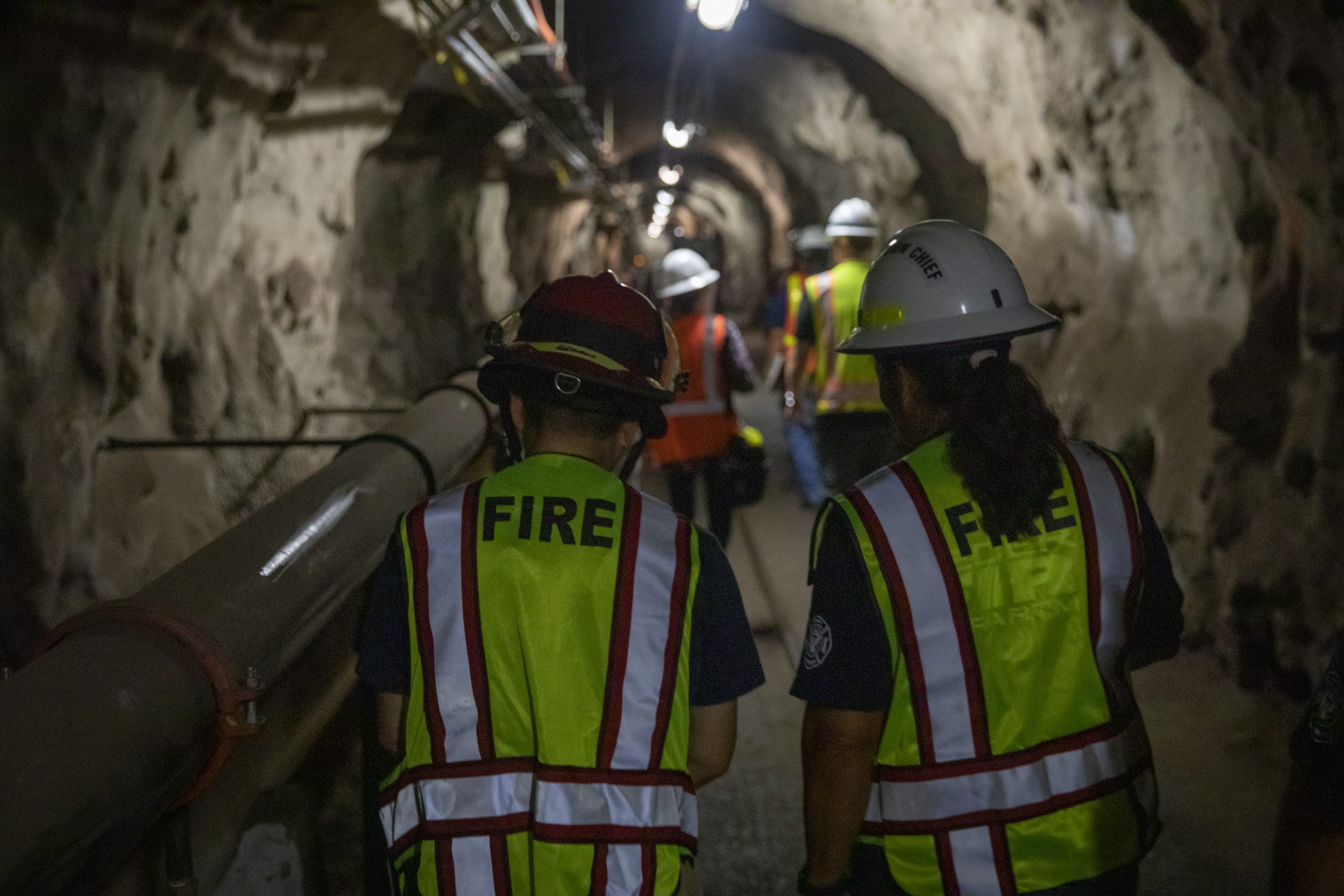Safety stakeholder representatives and first responders conduct a safety walk through to identify and eliminate hazards through the tunnels during the Red Hill Bulk Fuel Storage Facility (RHBFSF) Stakeholder Safety Walkthrough in Halawa, Hawaii, Oct. 12, 2022. Joint Task Force-Red Hill was established by the Department of Defense to ensure the safe and expeditious defueling of the RHBFSF. (U.S. Army photo by Spc. Matthew Mackintosh)
