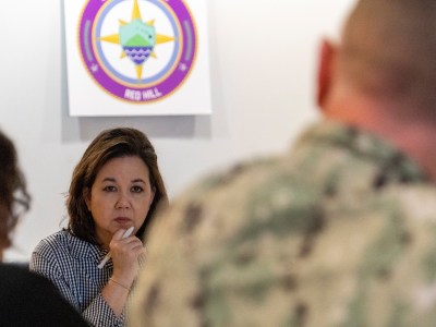 U.S. Rep. Jill Tokuda listens to a brief given by a Joint Task Force-Red Hill (JTF-RH) official during a table-top meeting as part of a Congressional Delegation (CODEL) visit at Joint Base Pearl Harbor-Hickam, Hawaii, Feb. 23, 2023. The CODEL toured the Red Hill Bulk Fuel Storage Facility (RHBFSF) and visited JTF-RH headquarters to gain insight into its mission and to understand steps the Department of Defense is taking to safely and expeditiously defuel the fuel storage facility. (U.S. Air National Guard photo by Staff Sgt. Orlando Corpuz)