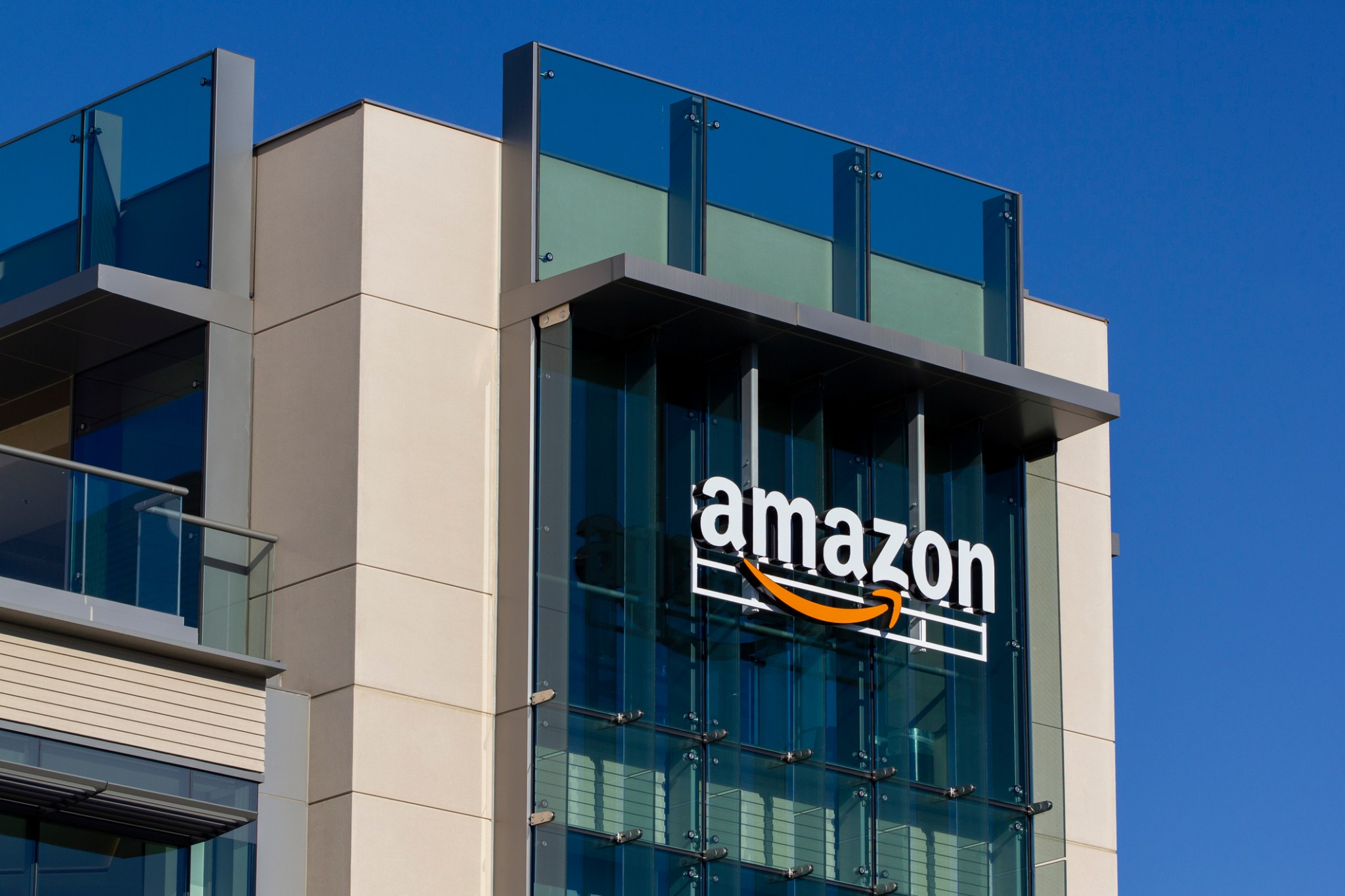 Palo Alto, CA, USA - Feb 18, 2020: The Amazon logo seen at Amazon campus in Palo Alto, California. The Palo Alto location hosts A9 Search, Amazon Web Services, and Amazon Game Studios teams.