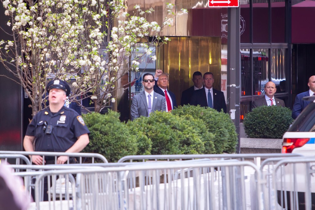President Trump  Giving Solidarity Fist before leaving Trump Town for arraignment