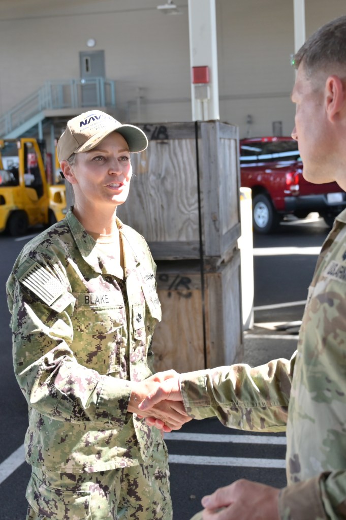 210930-N-TA290-1005 HONOLULU (September 30, 2021) Naval Supply Systems Command Fleet Logistics Center (NAVSUP FLC) Pearl Harbor's Executive Officer, Cmdr. Karlie Blake, says farewell to the 25th Infantry Division (25th ID) Commanding General, Maj. Gen. Joseph Ryan following his visit to NAVSUP FLC Pearl Harbor's Ocean Terminal Division. (U.S. Navy photo by Daniel Mayberry/Released)