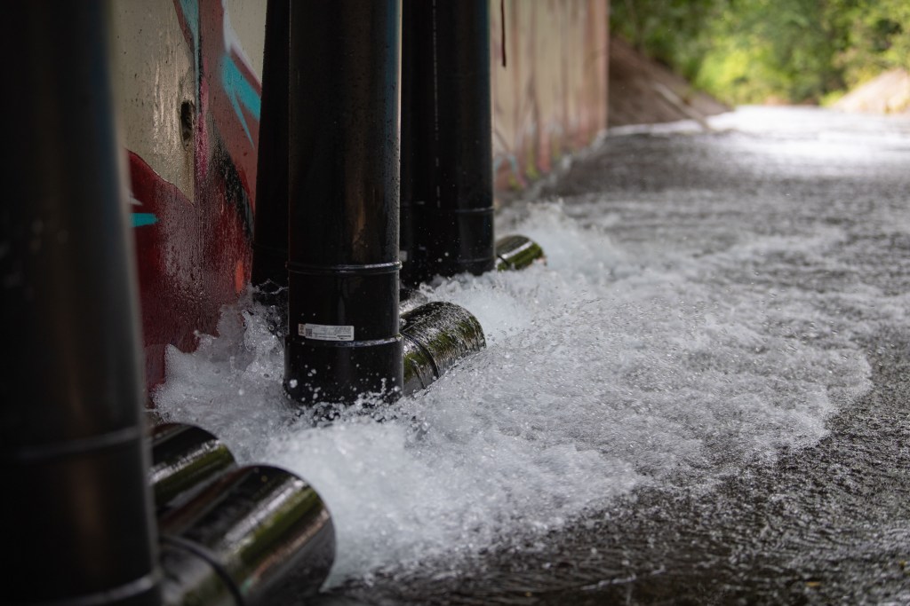 AIEA, Hawaii (Jan. 31, 2022) – Up to 3,500 gallons of water from the Red Hill Well is discharged into Halawa Stream after passing through a series of granular activated carbon (GAC) filters. The Interagency Drinking Water System Team is a joint initiative where the U.S. Navy is working closely with the Hawaii Department of Health, U.S. Environmental Protection Agency and the U.S. Army to restore safe drinking water to Joint Base Pearl Harbor-Hickam housing communities through sampling and flushing. For detailed information, go to: www.navy.mil/jointbasewater. (U.S. Navy photo by Mass Communication Specialist Seaman Christopher Thomas)