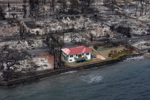 A building appears untouched by the wildfire which destroyed the historic town of Lahania Thursday, Aug. 10, 2023, on Maui. (Kevin Fujii/Civil Beat/2023)