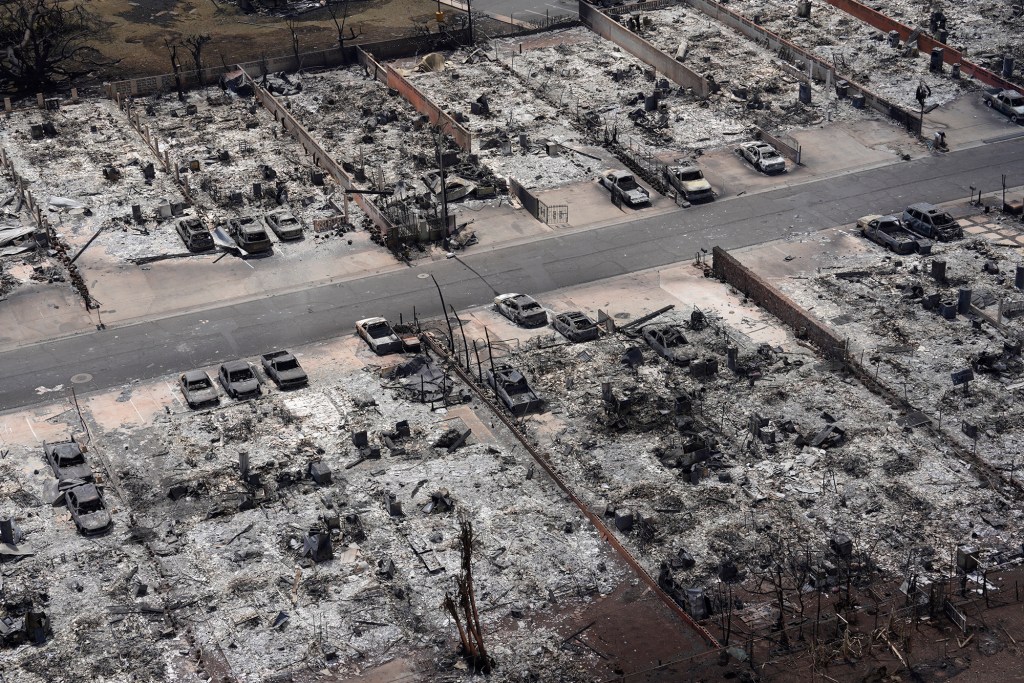 The destruction of Lahaina was clearly visible from the air. Aerial photos quickly became iconic portrayals throughout the world. (Kevin Fujii/Civil Beat/2023)