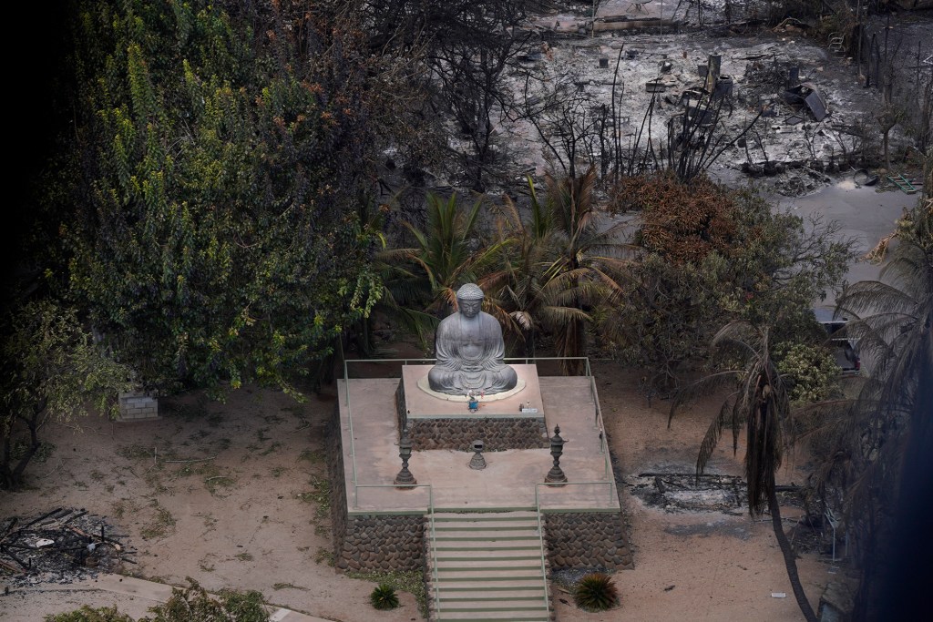 The Buddha at Lahania Jodi Mission appears untouched by Tuesday’s wildfire, photographed Thursday, Aug. 10, 2023, in Maui. (Kevin Fujii/Civil Beat/2023)
