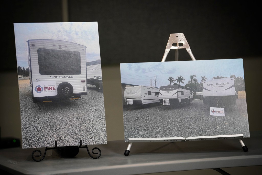 Photographs of the trailers donated by the California Fire Foundation are on display at the Hawaii Fire Fighters Association Local 1463 press conference Wednesday, Aug. 23, 2023, in Honolulu. California Fire Foundation, EmergencyRV and Los Angeles County Fire Fighters Local 1014 donated five RV (recreation vehicle) trailer homes to Maui firefighters who lost their homes in the Aug. 8 Lahaina wildfire. (Kevin Fujii/Civil Beat/2023)