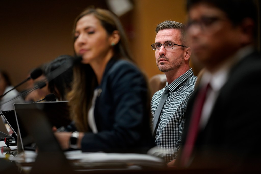 Honolulu City Councilman for district 2 Matt Weyer listens to the department of transportation director J. Roger Morton discuss restricted parking zones Wednesday, Sept. 6, 2023, in Honolulu. (Kevin Fujii/Civil Beat/2023)