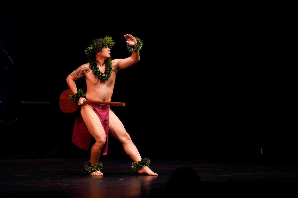 Okuto Horiuchi of the Halau Hula Manaiakalani Iapana performs in the Ku Mai Ka Hula Kane Kahiko competition  at the Maui Arts and Culture Center, Sept. 9, 2023, in Kahului. Life slowly returns to normal on Maui after the devastating August 8 wildfires. (Kevin Fujii/Civil Beat/2023)