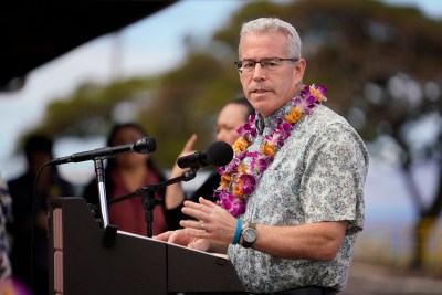 Director of the state Department of Health Dr. Kenneth Fink addresses concerns for safety during Hawaii State Department of Education’s announcement to reopen schools in West Maui on Tuesday, Sept. 26, 2023, at Kapalua Airport in Lahaina. The Army Corps of Engineers will be building a temporary replacement school for King Kamehameha III Elementary. (Kevin Fujii/Civil Beat/2023)