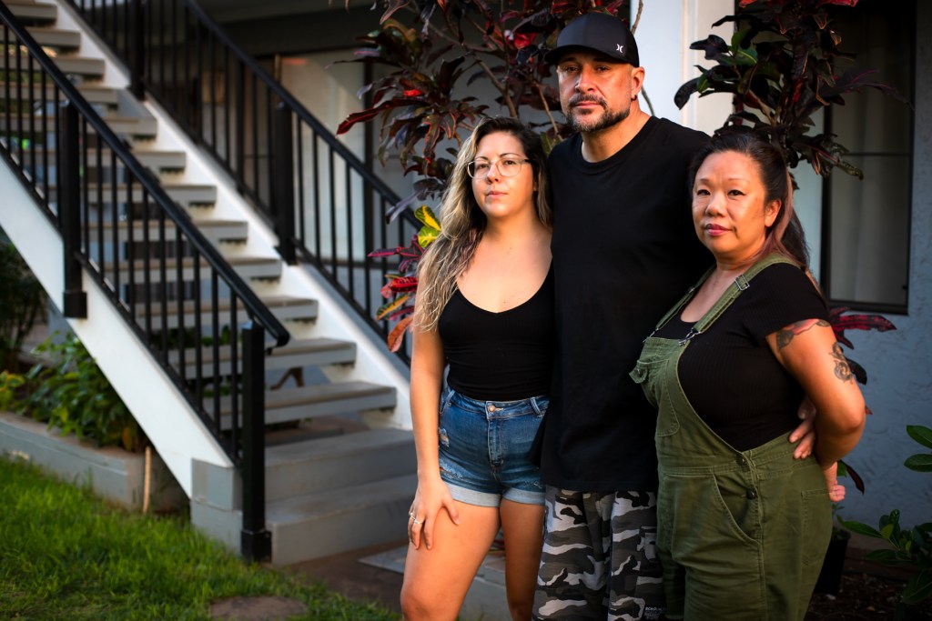 From left, Ali, Ray and Fanny escaped the fire in Lahaina on Aug. 8. They now live at a rental in Kihei. (Nathan Eagle/Civil Beat/2023)