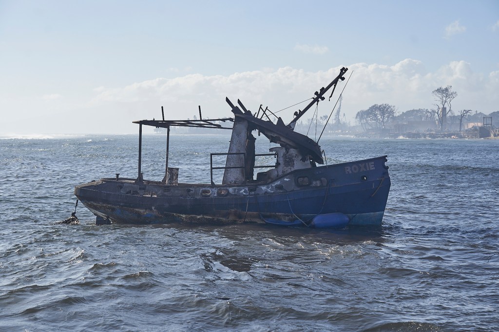The fire quickly burned through much of Lahaina town and flying cinders propelled by high winds even engulfed boats moored in the harbor. (Ku'u Kauanoe/Civil Beat/2023)