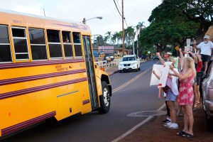 Lahainaluna supporters welcome students back to their campus Monday, Oct. 16, 2023, in Lahaina. The school has been closed since the Aug. 8 fire and studying at other schools in Maui. (Kevin Fujii/Civil Beat/2023)