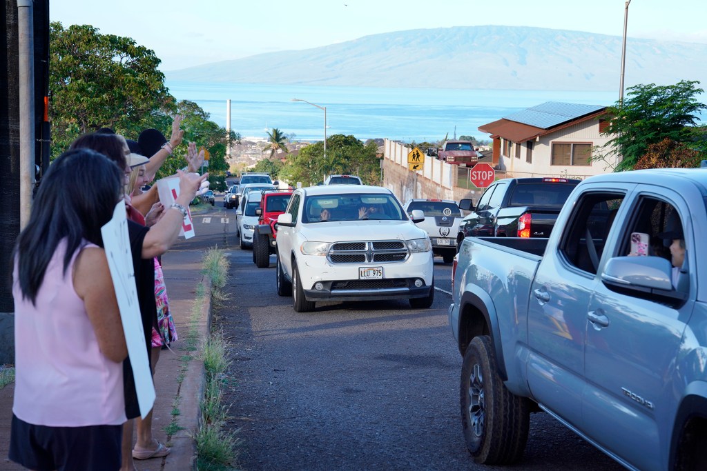 Elementary school students return to a Lahaina campus Wednesday, Oct. 18, 2023. Princess Nahienaena Elementary School opened their campus for King Kamehameha III Elementary School to place temporary buildings. The schools have been closed since the Aug. 8 fire and studying at other schools in Maui. King Kamehameha III Elementary School was destroyed in the blaze. (Kevin Fujii/Civil Beat/2023)