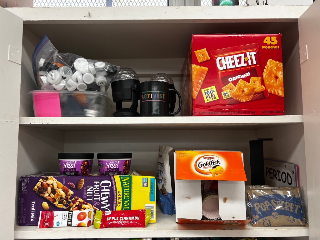 Sarah Milianta-Laffin keeps snacks for her students in her classroom, knowing that some cannot afford to buy school meals.