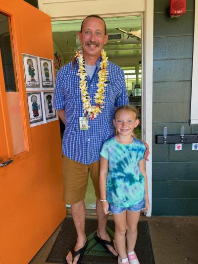 Robert Livermore stands with his daughter outside of his King Kamehameha III classroom with his daughter on Aug. 4.