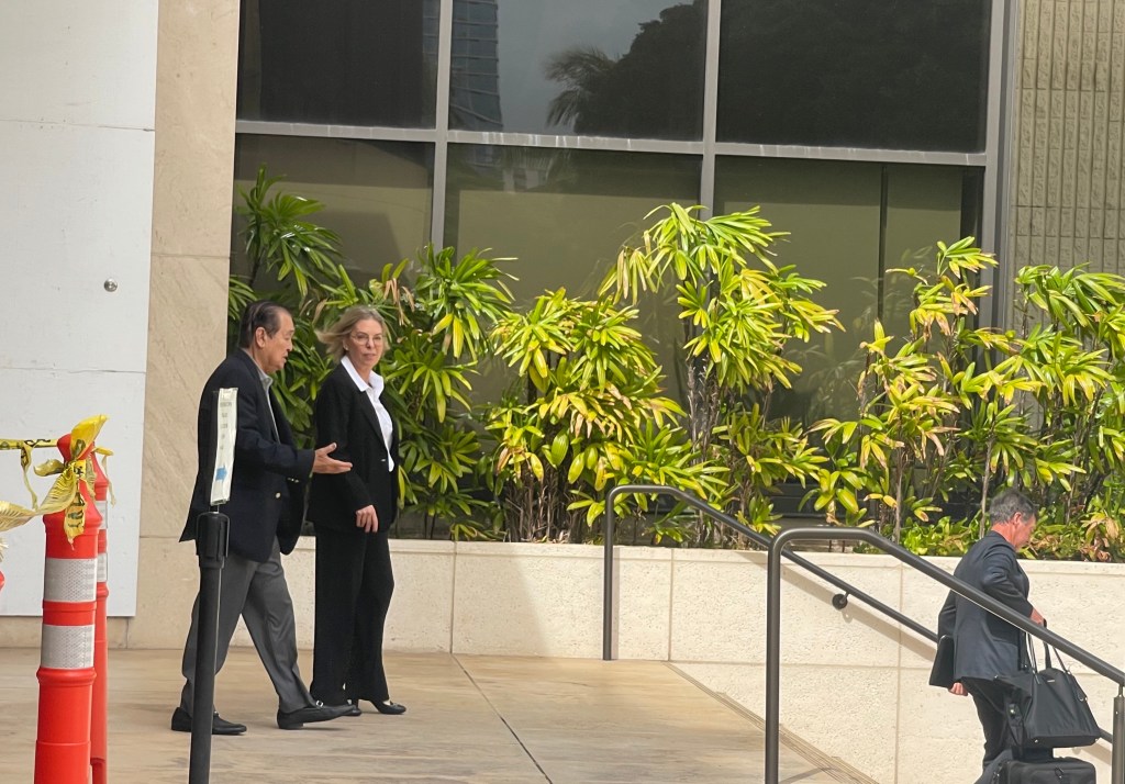 Dennis Mitsunaga appeared in federal court on Nov. 7, 2023 with his attorney Nina Marino. (Christina Jedra/CivilBeat/2023)