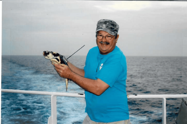 Taken ca 2008 releasing a satellite-tagged juvenile loggerhead off the coast of Japan.
(Courtesy: George Balazs)